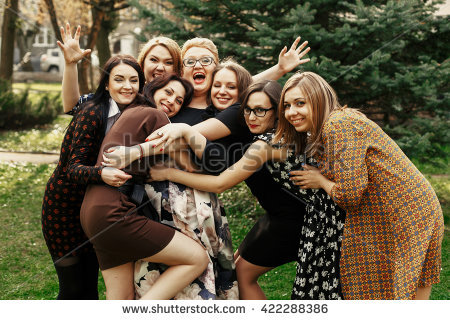 stock-photo-stylish-elegant-women-having-fun-at-celebration-in-sunny-park-funny-moment-concept-gathering-422288386